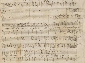 Ausschnitt aus einer Partiturseite im 8. Band der Faksimile-Ausgabe der Werke Marc-Antoine Charpentiers (http://www.ranumspanat.com/portrait_charpentier.htm; Gallica), in dem auch die Weihnachtsmotetten enthalten sind.