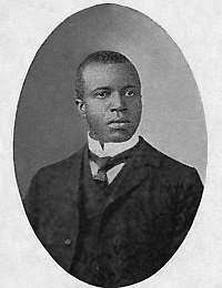 Einer, der die Menschen mit seiner Musik glücklich macht(e): Scott Joplin auf einem Porträt vom 7.6.1903 (Library of Congress, Urheber unbekannt, p.d.).